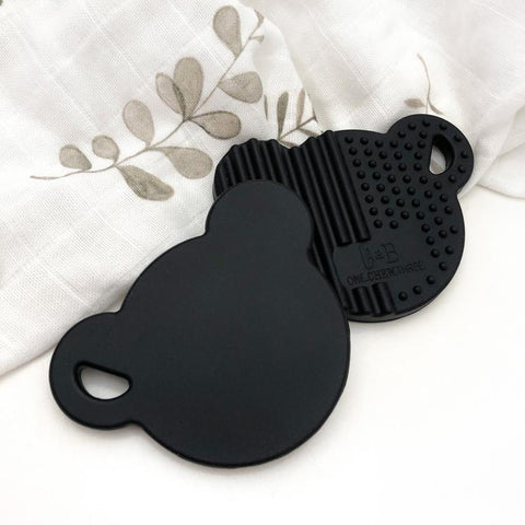 One.Chew.Three Silicone Bear Teether Disc in Black with texture to aid teething