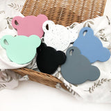 One.Chew.Three Silicone Bear Teething Disc in Pink, Blue, Mint, Grey, White & Black 