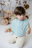 Snuggle Hunny Waterproof Bib in Sprout
