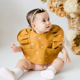 Snuggle Hunny Waterproof Bib in Sunrise with Frills